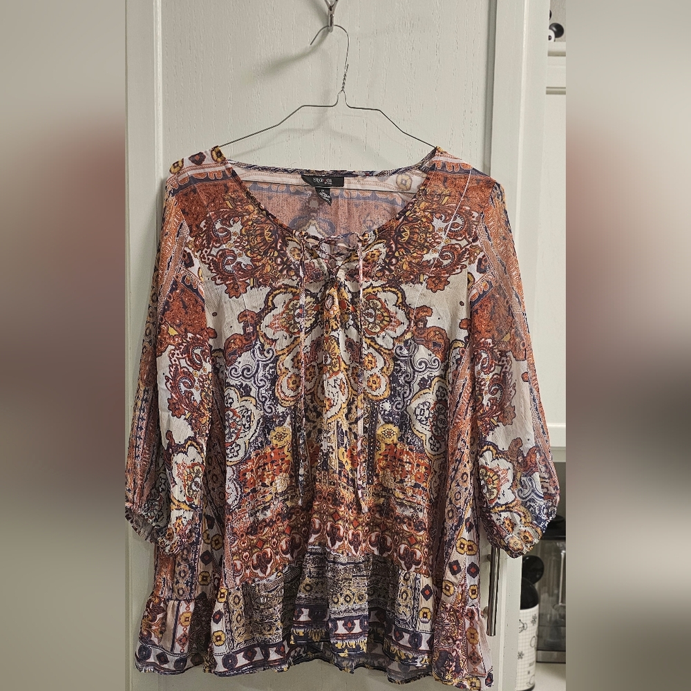 1XL cream blouse with orange and blue patterns